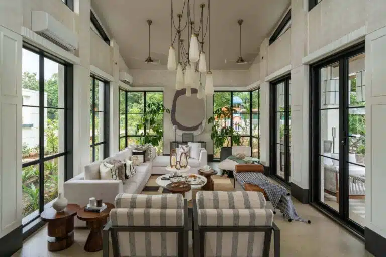 Comfortable lounge area with stylish interiors at Riyuvann Estate luxury villa in Alibaug