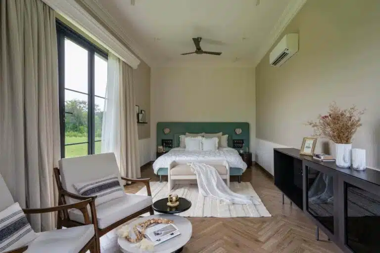 Sophisticated bedroom featuring premium decor at Riyuvann Estate in Alibaug